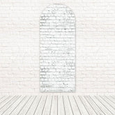 Toile de fond pour arche ambiance rustique propre mur briques blanches pour installation minimale