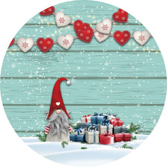 Cadeau de noël et coeur en toile de fond ronde en bois de neige