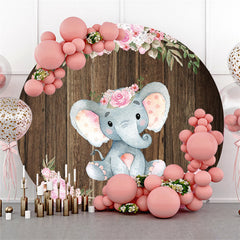 Fond de fête de naissance en bois d'éléphant floral rose de cercle