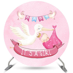 C'est une toile de fond ronde pour fête prénatale avec une fille et un oiseau rose