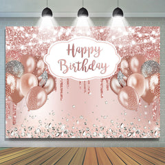 Fond de joyeux anniversaire de ballon de paillettes d'or rose