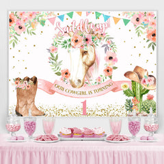 Selle en toile de fond rose floral et cheval premier anniversaire
