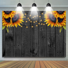 Tournesols et toile de fond de fête d'anniversaire en bois noir