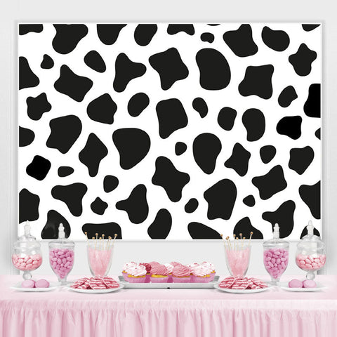 Fond de vache noir et blanc pour la fête d'anniversaire des enfants