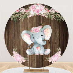 Fond de fête de naissance en bois d'éléphant floral rose de cercle
