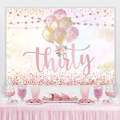 Toile de fond de ballon doré et rose pour trente ans