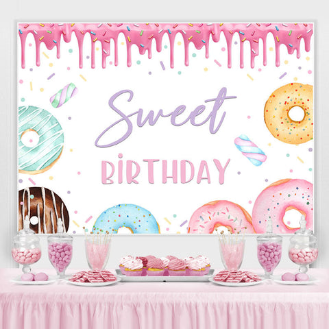 Beignets arc-en-ciel joyeux anniversaire doux toile de fond