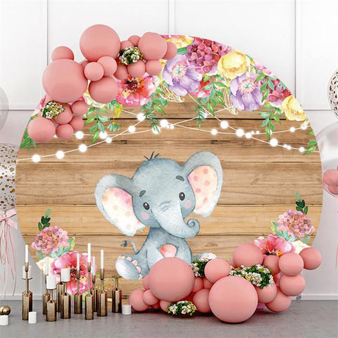 Toile de fond en bois pour fête prénatale avec éléphant rond et floral