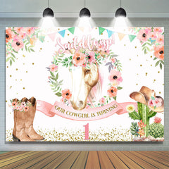 Selle en toile de fond rose floral et cheval premier anniversaire
